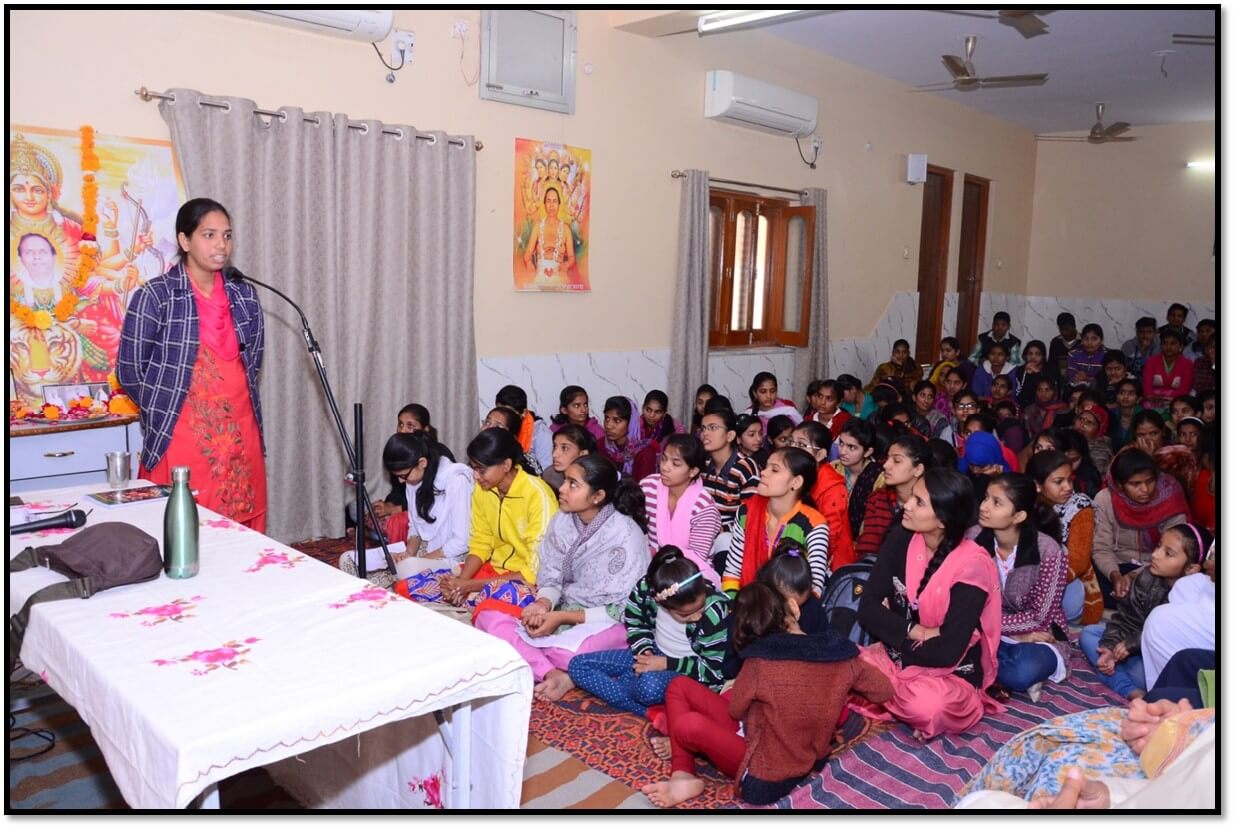 A student confidently addressing an audience